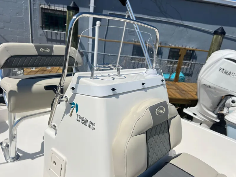 Slide: The Image of 2025 Key West 1720 Center Console boat with Yamaha engine, featuring sleek design and comfortable seating. - 16