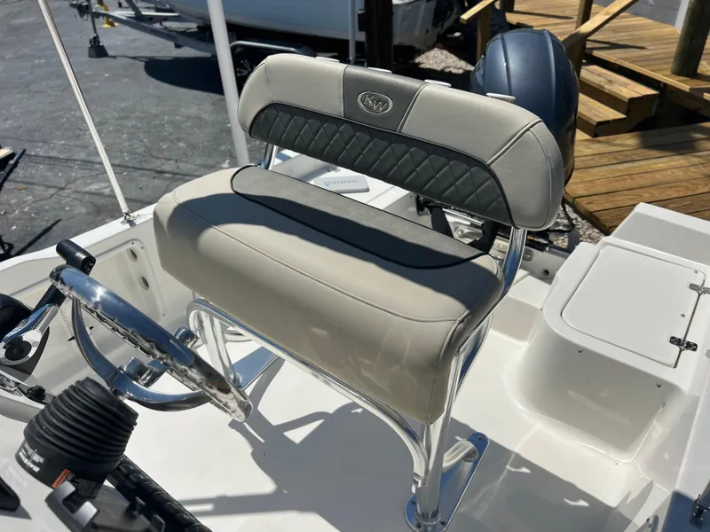 Slide: The Image of 2025 Key West 1720 Center Console boat seat and steering wheel detail. - 25