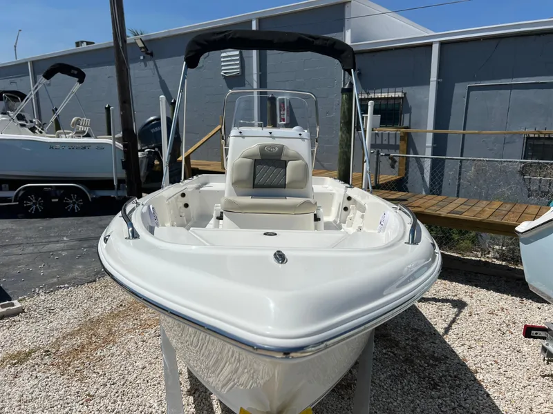 Slide: The Image of 2025 Key West 1720 Center Console boat displayed outdoors on gravel. - 3