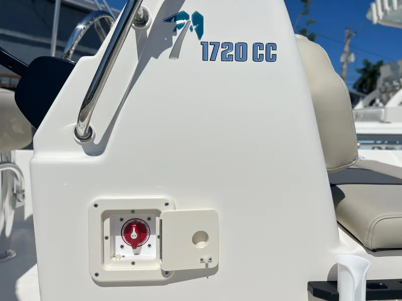 Slide: The Image of 2025 Key West 1720 Center Console boat detail with control panel and seating. - 35