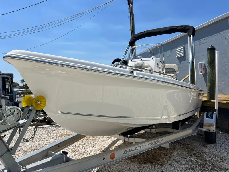 Slide: The Image of 2025 Key West 1720 Center Console boat on trailer, sunny day. - 4