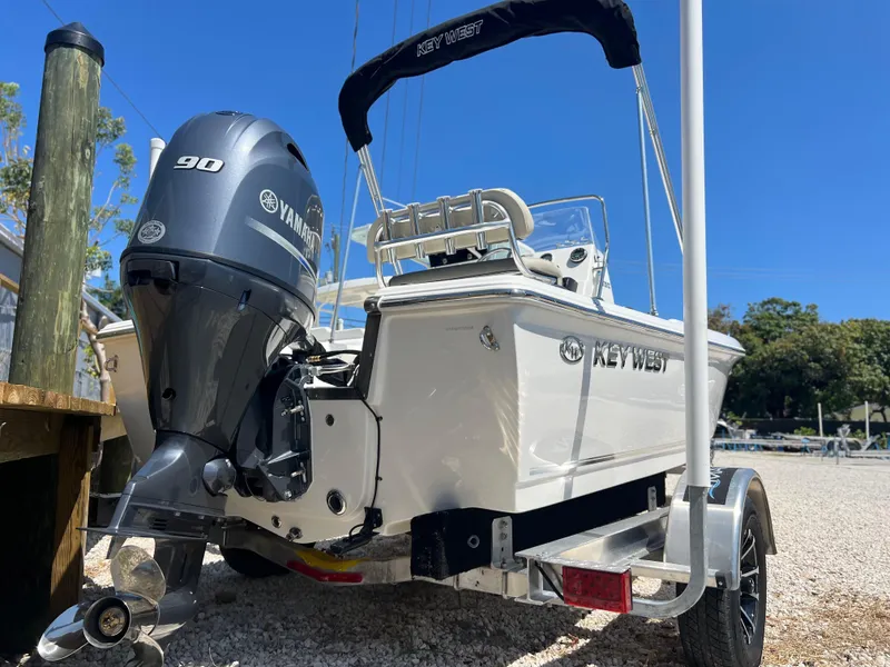 Slide: The Image of 2025 Key West 1720 Center Console boat with Yamaha 90 engine on trailer. - 5