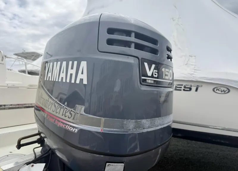 Slide: The Image of Yamaha V6 150 outboard motor on a 2000 Grady-White Adventure 208 boat. - 20