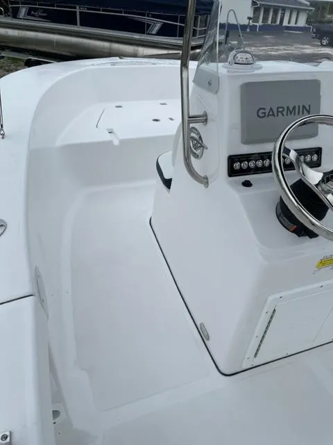 Slide: The Image of 2024 Tidewater 180 CC Adventure boat interior with Garmin navigation system. - 16