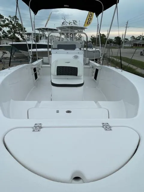 Slide: The Image of 2024 Tidewater 180 CC Adventure boat, spacious deck, center console, sleek design, ideal for fishing. - 18