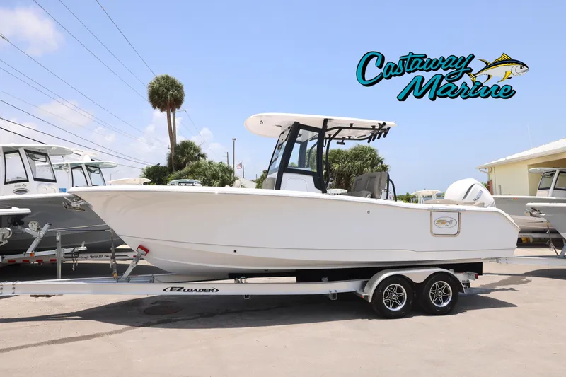 The Image of 2026 Sea Hunt Ultra 255 SE boat on trailer at Castaway Marine dealership. - 0