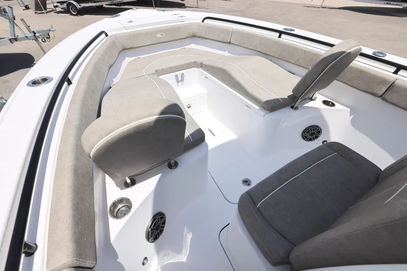 Slide: The Image of 2026 Sea Hunt Ultra 255 SE boat T-top with rod holders and speakers. - 12