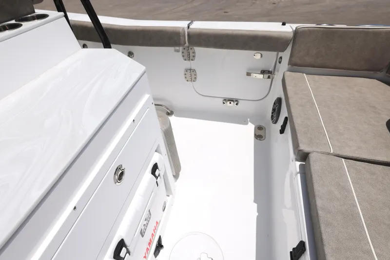 Slide: The Image of 2026 Sea Hunt Ultra 255 SE boat with Yamaha outboard motor on a trailer. - 17