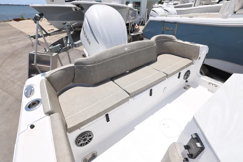 Slide: The Image of Interior of 2026 Sea Hunt Ultra 255 SE boat with seating and storage. - 20