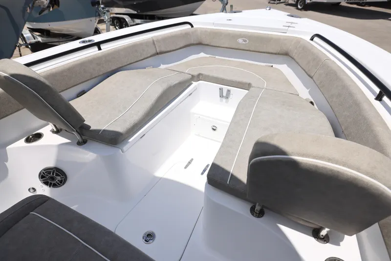 Slide: The Image of 2026 Sea Hunt Ultra 255 SE boat interior with seating and storage. - 3