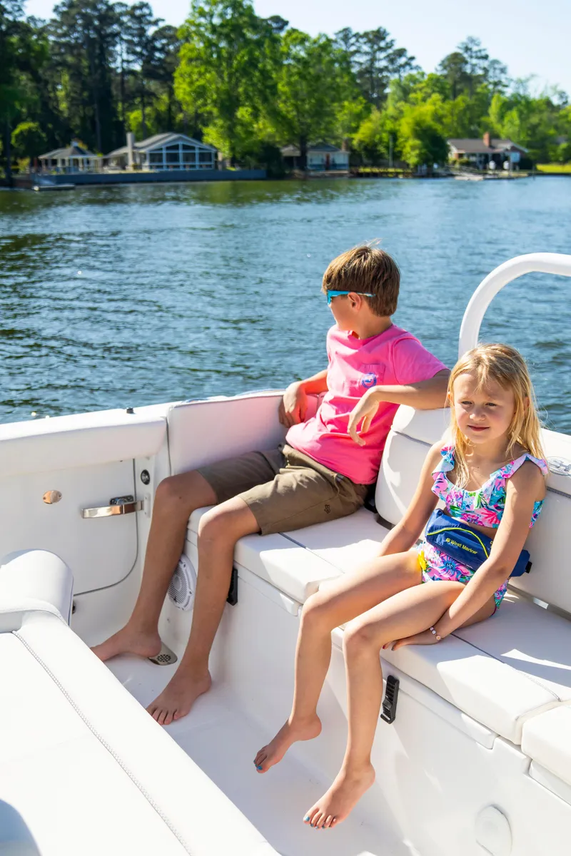 Slide: The Image of 2026 Sea Hunt Ultra 255 SE boat cruising on open water. - 40