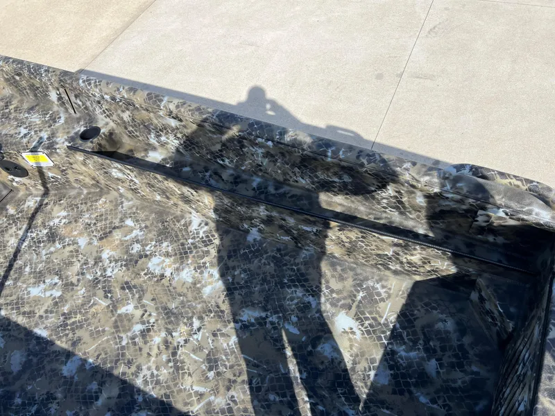 Slide: The Image of Shadow on Excel Eclipse 2025 boat with camouflage pattern. - 16