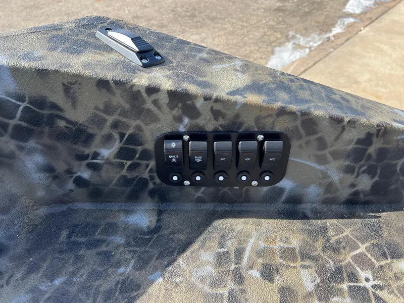 Slide: The Image of Control panel on 2025 Excel Eclipse boat with camouflage pattern. - 20