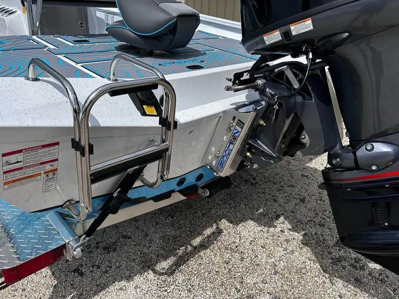 Slide: The Image of 2025 Xpress H20B boat with motor and ladder on a trailer. - 20