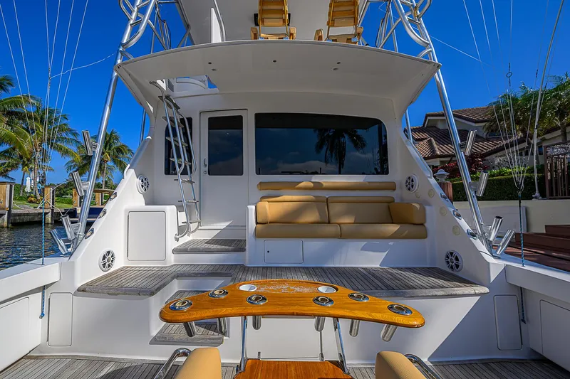 Slide: The Image of 2007 Viking 68 Convertible yacht with spacious deck and seating area. - 2