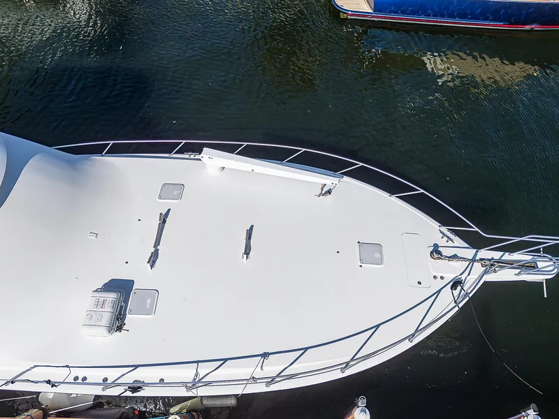 Slide: The Image of Aerial view of 2007 Viking 68 Convertible yacht's bow on water. - 21