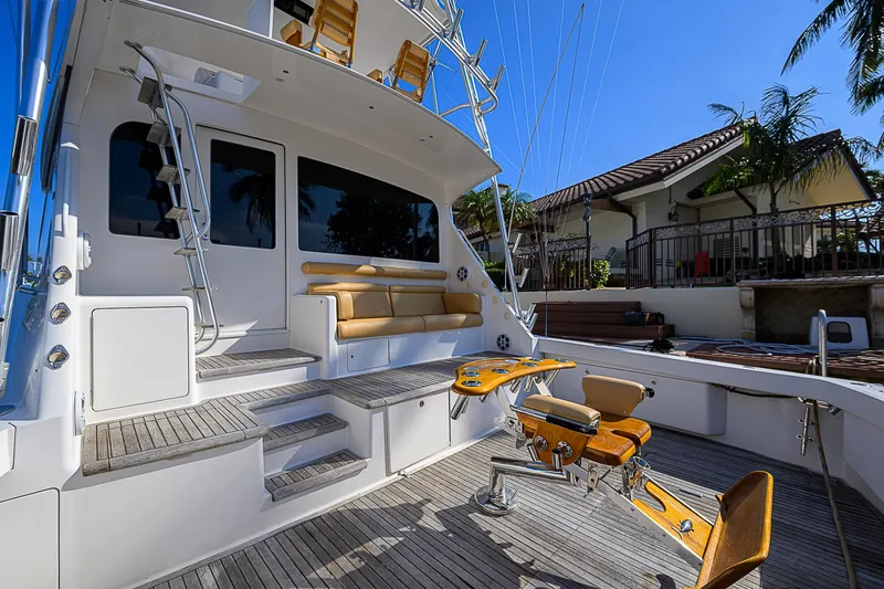 Slide: The Image of 2007 Viking 68 Convertible yacht deck with seating and fishing chair. - 26