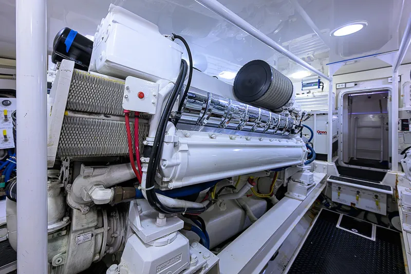 Slide: The Image of Engine room of 2007 Viking 68 Convertible yacht, showcasing powerful machinery and clean design. - 37