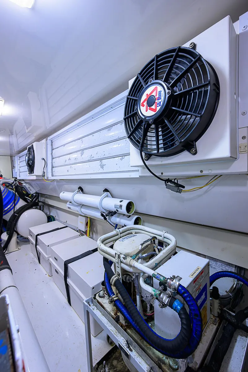 Slide: The Image of Engine room of 2007 Viking 68 Convertible yacht with cooling systems and equipment. - 39