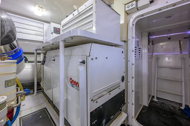 Slide: The Image of Engine room of 2007 Viking 68 Convertible yacht with Onan generator and equipment. - 41