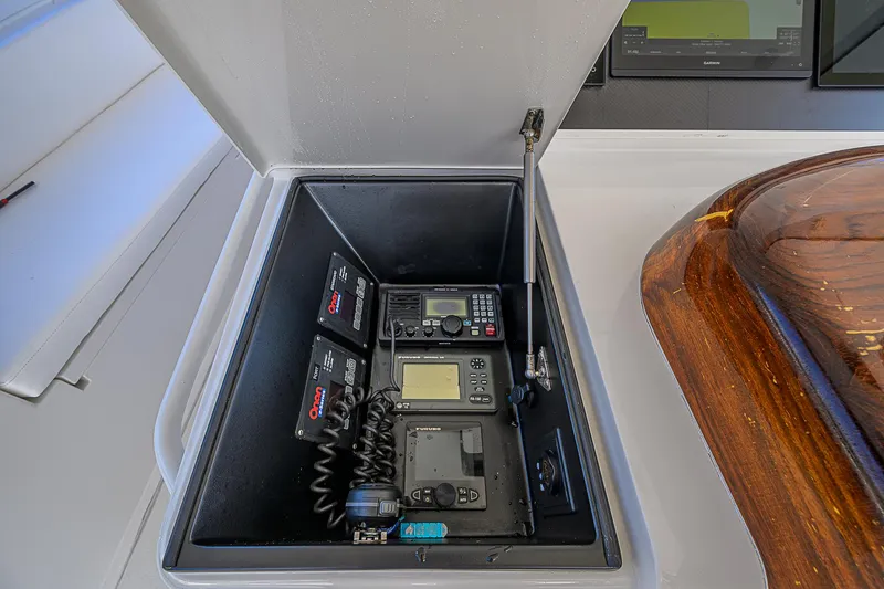 Slide: The Image of Communication equipment in a 2007 Viking 68 Convertible yacht's control panel. - 49