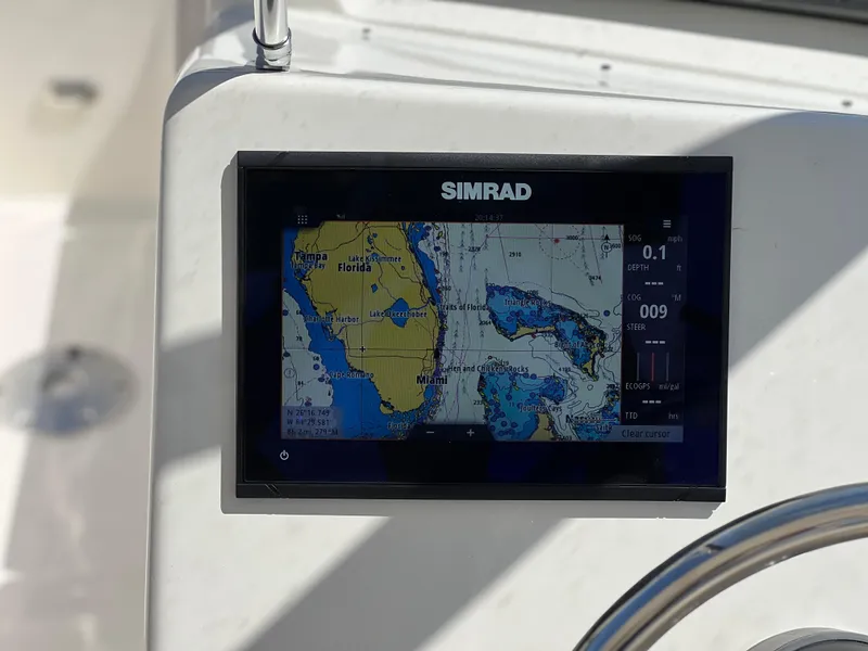 Slide: The Image of Simrad navigation display on 2025 Key West 239 DFS boat dashboard. - 24
