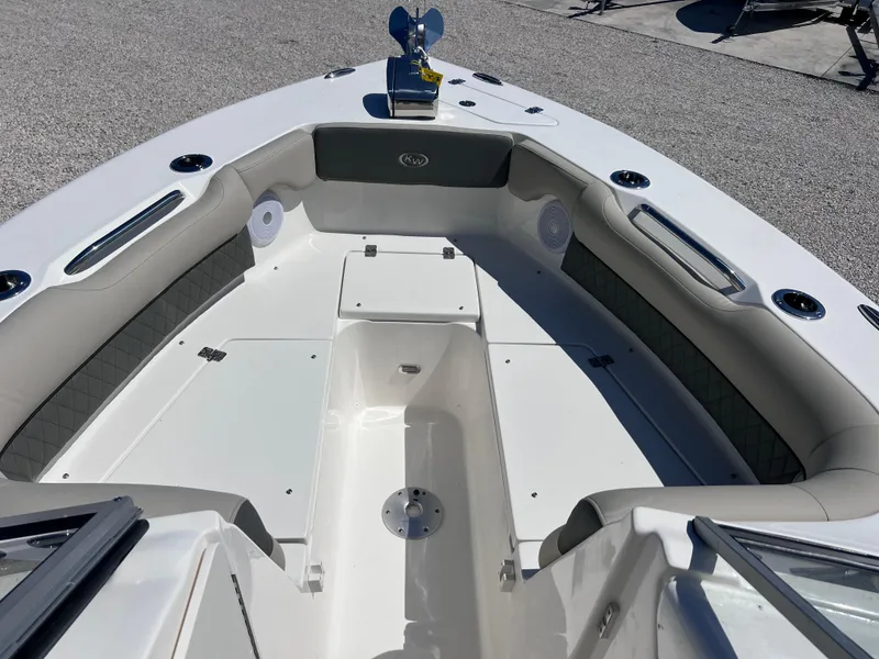 Slide: The Image of 2025 Key West 239 DFS boat interior with spacious seating and modern design. - 9