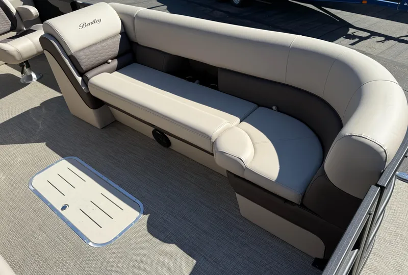 Slide: The Image of 2025 Bentley Pontoons Elite 253 Admiral interior seating with beige upholstery. - 11
