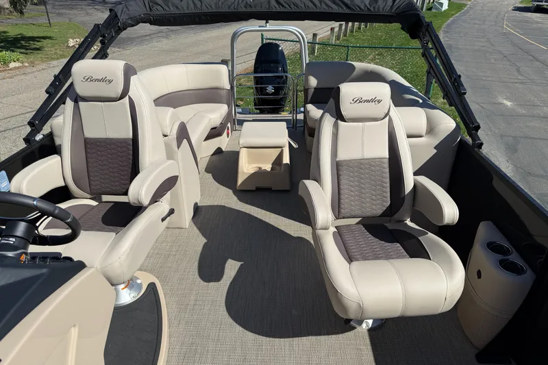 Slide: The Image of 2025 Bentley Pontoons Elite 253 Admiral interior with luxurious seating and modern design. - 15
