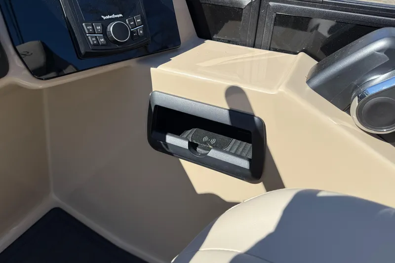 Slide: The Image of 2025 Bentley Pontoons Elite 253 Admiral dashboard with modern controls and sleek design. - 22