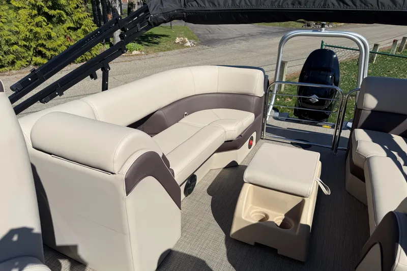 Slide: The Image of 2025 Bentley Pontoons Elite 253 Admiral interior with plush seating and modern design. - 27