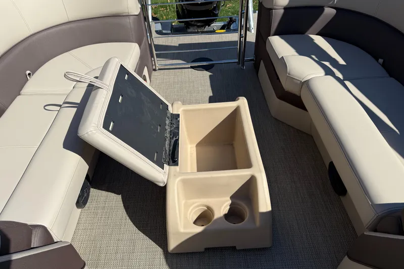 Slide: The Image of Interior of 2025 Bentley Pontoons Elite 253 Admiral with seating and storage compartment. - 29