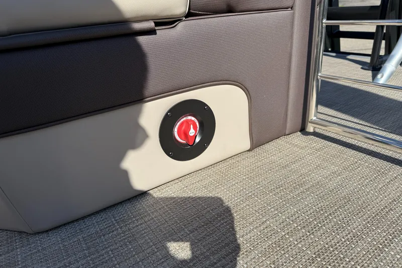 Slide: The Image of 2025 Bentley Pontoons Elite 253 Admiral interior detail with red control knob. - 36