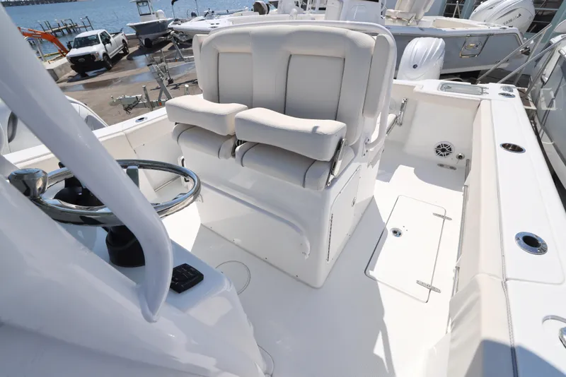 Slide: The Image of Open storage compartment on 2026 Sea Hunt Gamefish 27 Coffin Box boat. - 10