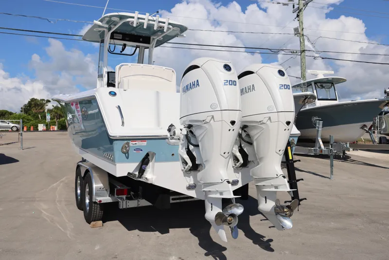 Slide: The Image of 2026 Sea Hunt Gamefish 27 Coffin Box; Yamaha outboard sales event promotion. - 2