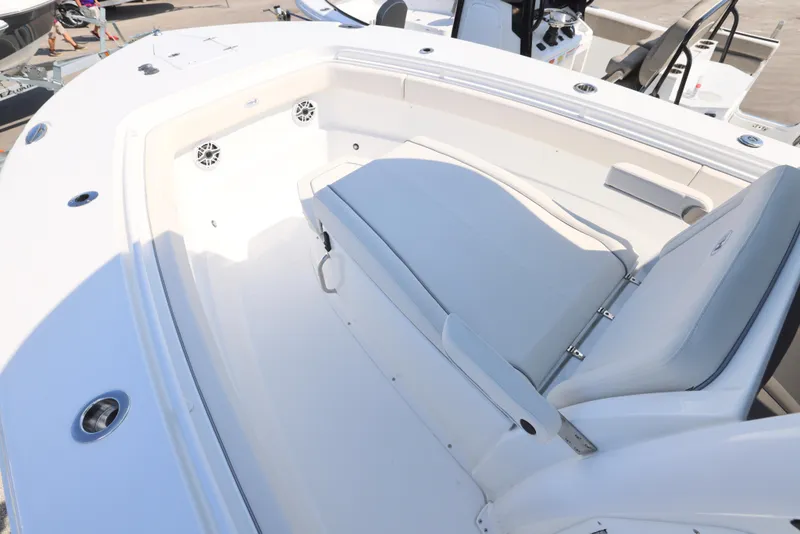 Slide: The Image of 2026 Sea Hunt Gamefish 27 Coffin Box boat interior with seating and dual engines. - 4