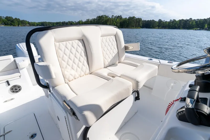 Slide: The Image of Diamond-stitched white upholstery on 2026 Sea Hunt Gamefish 27 Coffin Box boat seat. - 43