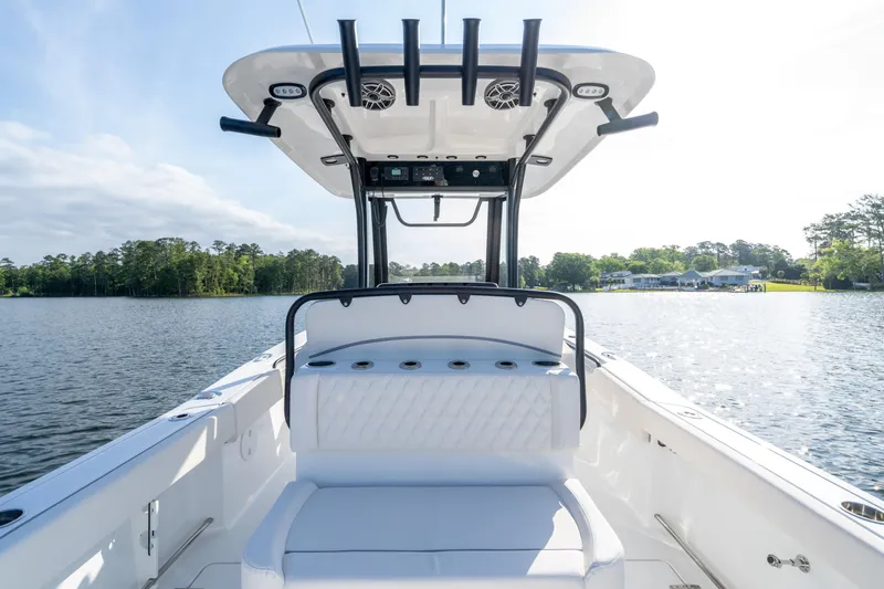 Slide: The Image of 2026 Sea Hunt Gamefish 27 Coffin Box boat interior on a sunny lake. - 49