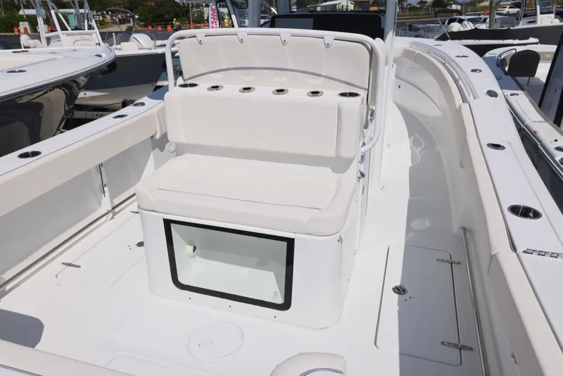 Slide: The Image of 2026 Sea Hunt Gamefish 27 Coffin Box helm with Garmin display and controls. - 6