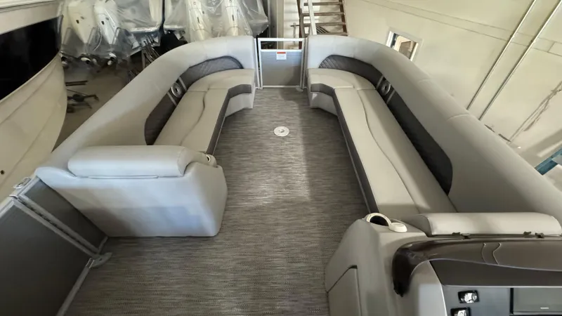 Slide: The Image of 2023 Bennington 25 LSB pontoon boat interior with spacious seating and modern design. - 18