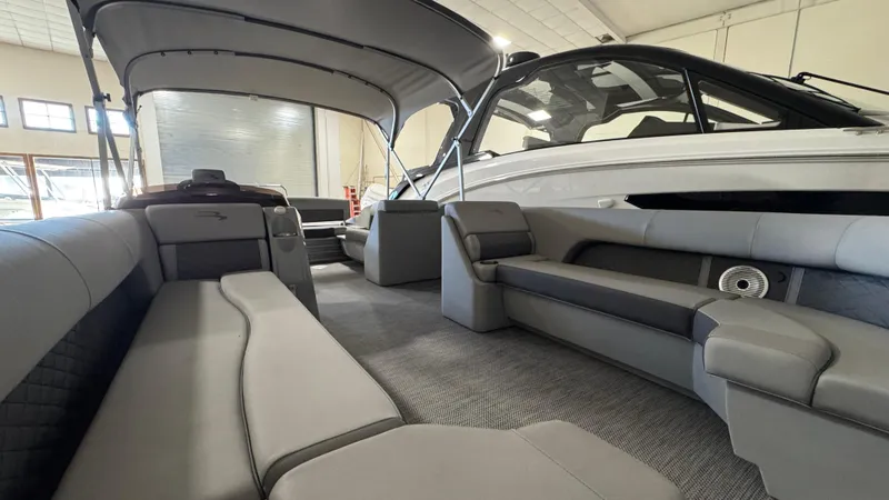 Slide: The Image of 2023 Bennington 25 LSB boat interior with spacious seating and modern design. - 21