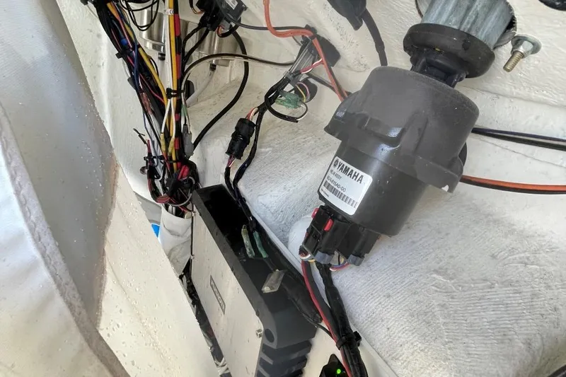 Slide: The Image of Wiring and components inside a 2021 Sea Hunt 239 Ultra SE boat. - 18