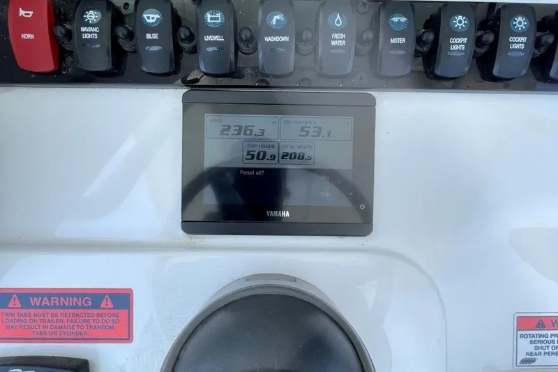 Slide: The Image of Control panel of 2021 Sea Hunt 239 Ultra SE boat with Yamaha display and switches. - 23