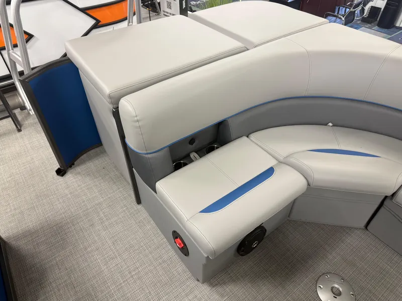 Slide: The Image of 2025 Bentley Pontoons Legacy 240 Cruise interior with gray and blue seating. - 18