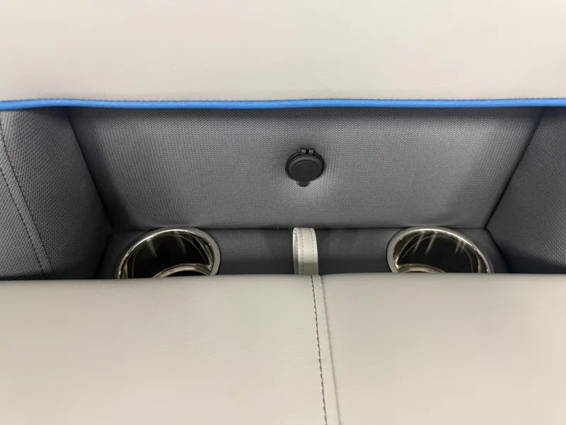 Slide: The Image of 2025 Bentley Pontoons Legacy 240 Cruise interior cup holders and USB port detail. - 23