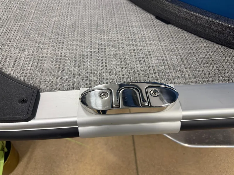 Slide: The Image of 2025 Bentley Pontoons Legacy 240 Cruise deck detail with metal cleat and textured surface. - 5