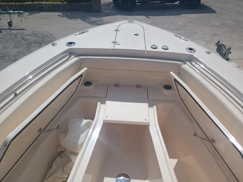 Slide: The Image of 2025 Grady-White Canyon 306 boat interior with storage compartments and seating. - 15