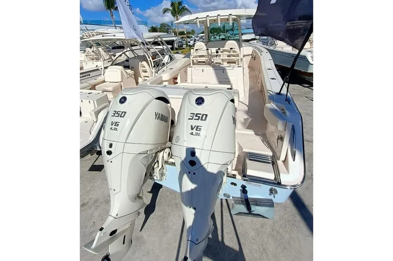 Slide: The Image of 2025 Grady-White Canyon 306 boat with twin Yamaha 350 V6 engines. - 37
