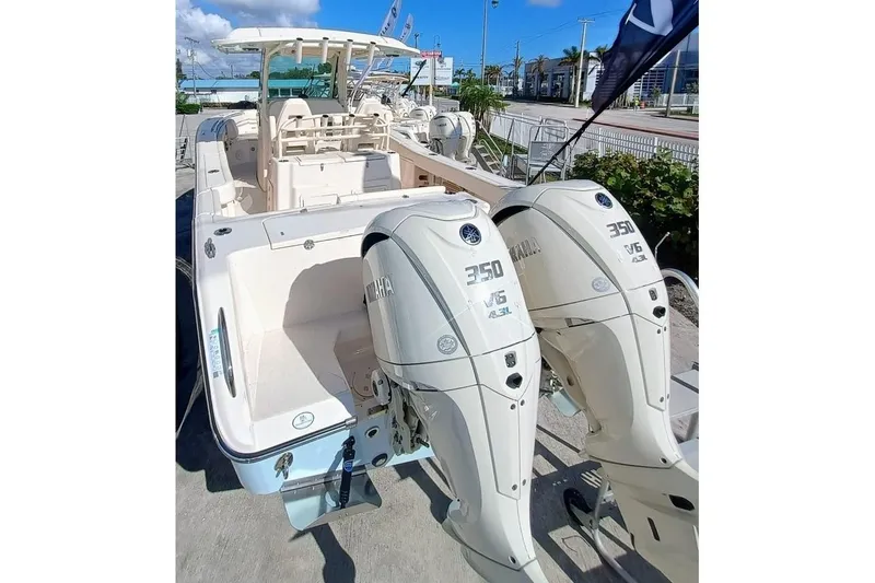 Slide: The Image of 2025 Grady-White Canyon 306 boat with dual Yamaha 350 V6 engines. - 38