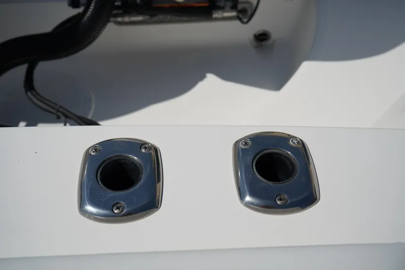 Slide: The Image of Stainless steel rod holders on 2018 Edgewater 262 CX boat deck. - 12